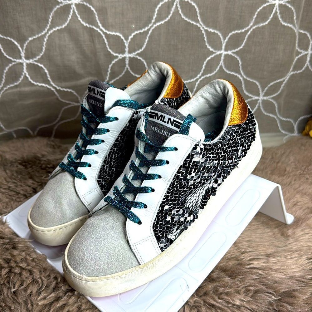(E4) Meline Italy silver sequined leather sneakers, size 7 women.